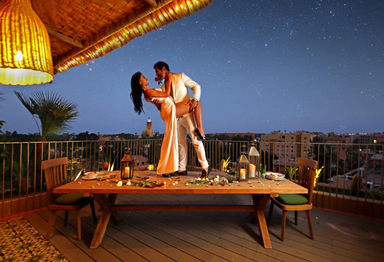Hotel Jadali & Spa Marrakesz Zewnętrze zdjęcie A couple dancing on a rooftop
